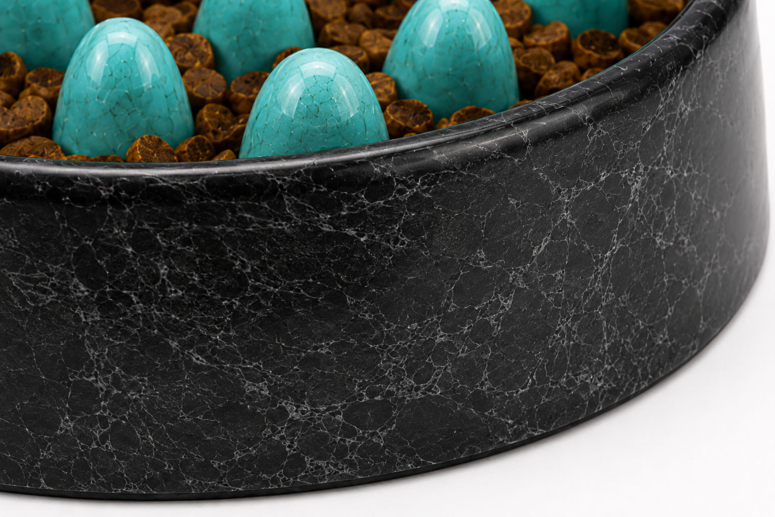 Black marble bowl filled with turquoise eggs on a brown speckled base Slow Feeder Dog Bowl – Anti-Gulping Interactive Pet Feeding Bowl - Image 2